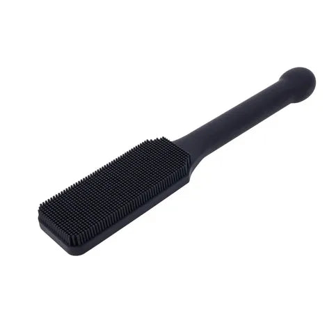 Black pins and needles paddle on a white background